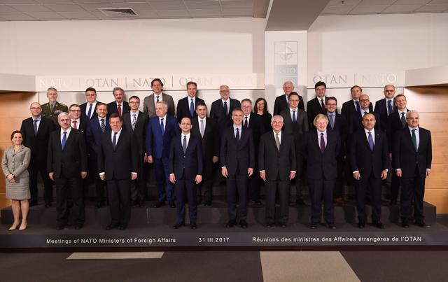 NATO secretary general Jens Stoltenberg (C), US secretary of state Rex Tillerson (fourth from right) with ministers of foreign affairs at NATO headquarters in Brussels on Friday. (AFP Photo)