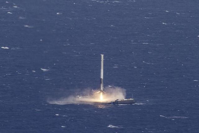 The reusable main-stage booster from the SpaceX Falcon 9 rocket makes a successful landing. (Handout/Reuters Photo) The reusable main-stage booster from the SpaceX Falcon 9 rocket makes a successful landing. (Handout/Reuters Photo)