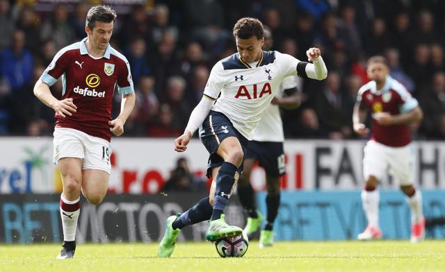 Tottenham's Dele Alli in action with Burnley's Joey Barton. (REUTERS) Tottenham's Dele Alli in action with Burnley's Joey Barton. (REUTERS)