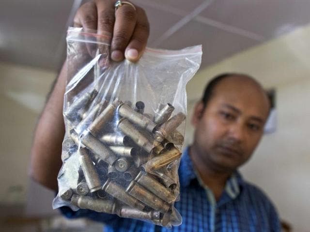 A forest official shows shell casings that were recovered from a site where a rhinoceros was killed by poachers with an AK-47 rifle at Kaziranga, a day after Britain's Prince William and his wife Kate spent a day at the Park on April 13, 2016. (AP FILE PHOTO) A forest official shows shell casings that were recovered from a site where a rhinoceros was killed by poachers with an AK-47 rifle at Kaziranga, a day after Britain's Prince William and his wife Kate spent a day at the Park on April 13, 2016. (AP FILE PHOTO)