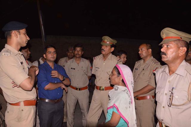 Police talk to family members of the children who died. (Sakib Ali) Police talk to family members of the children who died. (Sakib Ali)