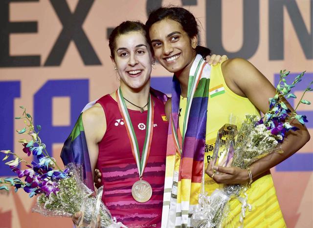 PV Sindhu (R) and Carolina Marin after the India Open final in New Delhi on Sunday. (PTI) PV Sindhu (R) and Carolina Marin after the India Open final in New Delhi on Sunday. (PTI)