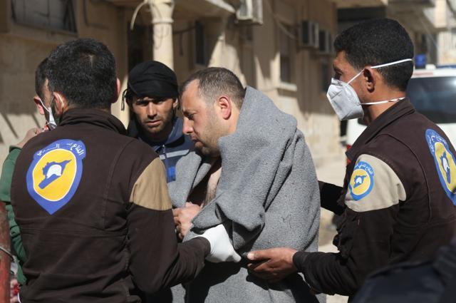 A Syrian man is taken by civil defence workers to a small hospital in the town of Maaret al-Noman following a suspected toxic gas attack in Khan Sheikhun, a nearby rebel-held town in Syria’s northwestern Idlib province, on April 4, 2017. (AFP Photo) A Syrian man is taken by civil defence workers to a small hospital in the town of Maaret al-Noman following a suspected toxic gas attack in Khan Sheikhun, a nearby rebel-held town in Syria’s northwestern Idlib province, on April 4, 2017. (AFP Photo)