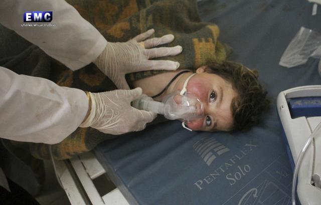 This photo provided by the Syrian anti-government activist group Edlib Media Center, which has been authenticated based on its contents and other AP reporting, shows a Syrian doctor treating a child following a suspected chemical attack, at a makeshift hospital, in the town of Khan Sheikhoun. (AP Photo) This photo provided by the Syrian anti-government activist group Edlib Media Center, which has been authenticated based on its contents and other AP reporting, shows a Syrian doctor treating a child following a suspected chemical attack, at a makeshift hospital, in the town of Khan Sheikhoun. (AP Photo)