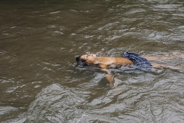 A girl swims in the Dahisar River. (Courtesy: Aslam Saiyad ) A girl swims in the Dahisar River. (Courtesy: Aslam Saiyad )
