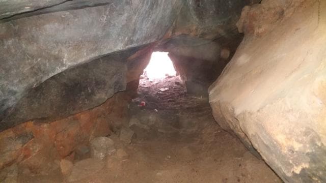 View from inside the cave where police found laptops, mobilephones and TVs stolen from neighbouring areas. (Shiv Sunny/HT photo) View from inside the cave where police found laptops, mobilephones and TVs stolen from neighbouring areas. (Shiv Sunny/HT photo)