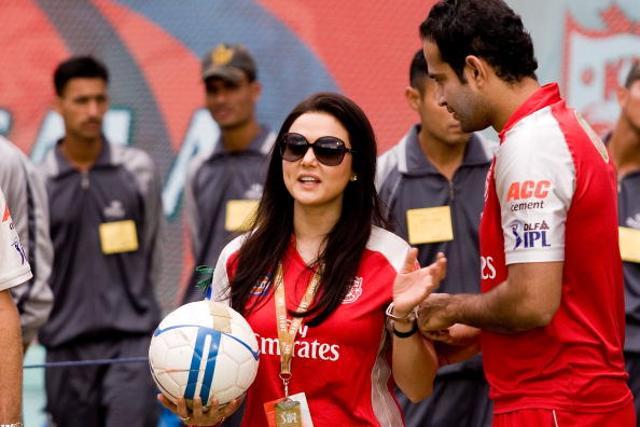 Preity Zinta (left) and Irfan Pathan speak during the 2010 Indian Premier League T20 group stage match between Kings XI Punjab and Chennai Super Kings in Dharamsala. (IPL via Getty Images) Preity Zinta (left) and Irfan Pathan speak during the 2010 Indian Premier League T20 group stage match between Kings XI Punjab and Chennai Super Kings in Dharamsala. (IPL via Getty Images)