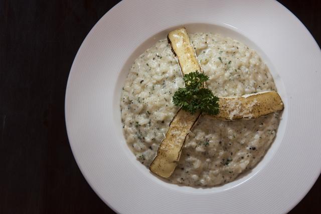 The three-cheese risotto isn’t the mushy mess usually served at casual-dining restaurants. You can taste the brie, padano and cheddar distinctly. (Aalok Soni/HT photo)