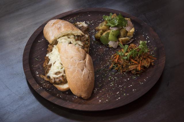 The mushroom cheese melt is drowning in spices, which kill the taste of the mushroom. (Aalok Soni/HT photo)