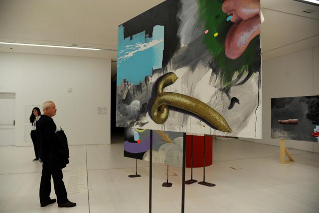 A visitor views art works by Ashley Hans Scheirl. (Reuters) A visitor views art works by Ashley Hans Scheirl. (Reuters)