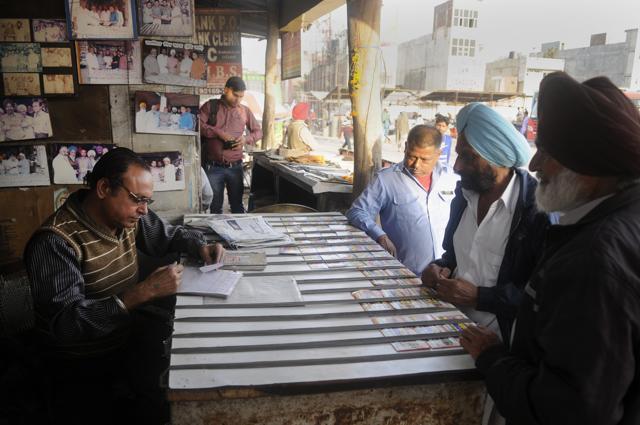 Naresh Kumar of Satpal Lottery Agency at the Bathinda bus terminal is one of more than 1500 paper lottery dealer in Punjab. (Burhaan Kinu/HT PHOTO) Naresh Kumar of Satpal Lottery Agency at the Bathinda bus terminal is one of more than 1500 paper lottery dealer in Punjab. (Burhaan Kinu/HT PHOTO)