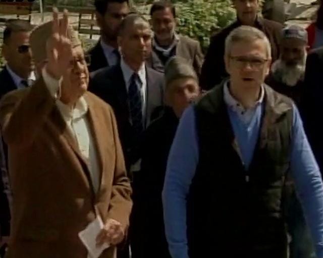 Farooq Abdullah and Omar Obadullah after casting their votes in Srinagar bypoll. (ANI) Farooq Abdullah and Omar Obadullah after casting their votes in Srinagar bypoll. (ANI)