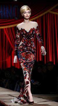 Model Gigi Hadid presents a creation from Moschino's Autumn/Winter 2017 women's collection during Milan Fashion Week in Milan, Italy, February 23, 2017. REUTERS/Stefano Rellandini (REUTERS) Model Gigi Hadid presents a creation from Moschino's Autumn/Winter 2017 women's collection during Milan Fashion Week in Milan, Italy, February 23, 2017. REUTERS/Stefano Rellandini (REUTERS)