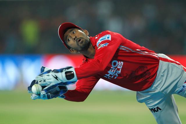Wriddhiman Saha took a great catch to dismiss Mandeep Singh as KXIP took regular wickets. (BCCI)