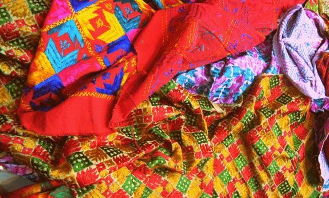 Phulkari odhnis, a mix of hand-embroidered and machine-made, clicked at a store in Patiala, Punjab. Phulkari odhnis, a mix of hand-embroidered and machine-made, clicked at a store in Patiala, Punjab.