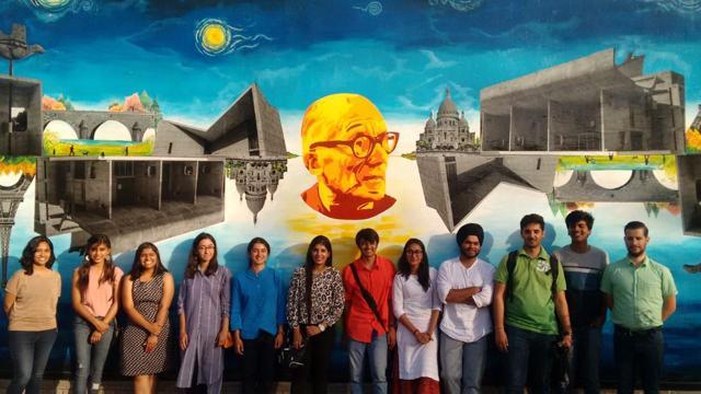 The team of artists in front of their creation. (HT Photo) The team of artists in front of their creation. (HT Photo)