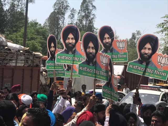 BJP supporters celebrate the party’s victory in Rajouri Garden bypoll on Thursday. (Abhinav Rajput / HT Photo)