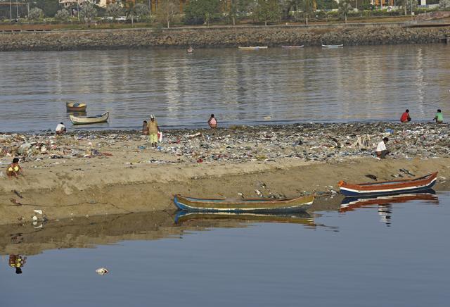 The packed, sprawling slums lining Mahim Causeway have few toilets that are useable. Portable toilets are not cleaned, which puts the residents off. The bank of the creek doubles up as both dump yard and toilets for the residents. (Vijayanand Gupta/HT Photo) The packed, sprawling slums lining Mahim Causeway have few toilets that are useable. Portable toilets are not cleaned, which puts the residents off. The bank of the creek doubles up as both dump yard and toilets for the residents. (Vijayanand Gupta/HT Photo)