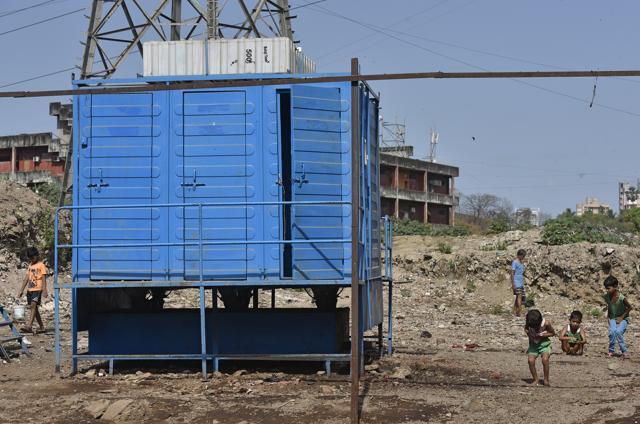 Mobile toilets like these were set up across Wadala a few months ago, when a team from New Delhi was in the city to see if open defecation took place. When the team left, the mobile toilets stopped getting water, nobody cleaned them and most residents from areas like Shanti Nagar and Himmat Nagar went back to going in the open. The few who do use these toilets have to carry their own water. (Vijayanand Gupta/HT Photo) Mobile toilets like these were set up across Wadala a few months ago, when a team from New Delhi was in the city to see if open defecation took place. When the team left, the mobile toilets stopped getting water, nobody cleaned them and most residents from areas like Shanti Nagar and Himmat Nagar went back to going in the open. The few who do use these toilets have to carry their own water. (Vijayanand Gupta/HT Photo)