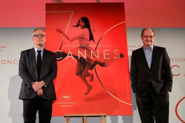 Cannes Film Festival general delegate Thierry Fremaux (left) and Cannes Film Festival president Pierre Lescure (right) pose in front of the official poster for the 70th Cannes Film Festival in Paris, France, April 13, 2017. (REUTERS) Cannes Film Festival general delegate Thierry Fremaux (left) and Cannes Film Festival president Pierre Lescure (right) pose in front of the official poster for the 70th Cannes Film Festival in Paris, France, April 13, 2017. (REUTERS)