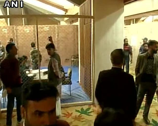 People gather at a counting centre in Srinagar. (ANI)