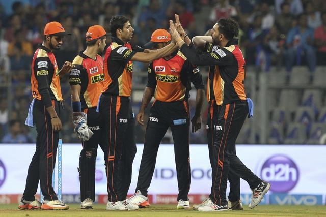 Sunrisers Hyderabad's Ashish Nehra celebrates Jos Buttler's wicket during their Indian Premier League match against Mumbai Indians at Wankhede Stadium on Wednesday (AP) Sunrisers Hyderabad's Ashish Nehra celebrates Jos Buttler's wicket during their Indian Premier League match against Mumbai Indians at Wankhede Stadium on Wednesday (AP)