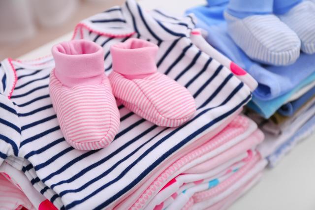 Keep your baby cool and comfortable in loose-fitting cotton clothing that lets her skin breathe. (Shutterstock) Keep your baby cool and comfortable in loose-fitting cotton clothing that lets her skin breathe. (Shutterstock)