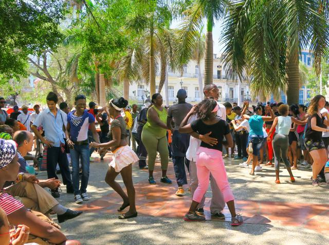 Tourists and locals take the dance floor in one of the central squares in Havana. (Shutterstock) Tourists and locals take the dance floor in one of the central squares in Havana. (Shutterstock)