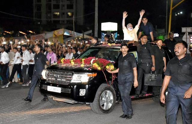 Prime Minister Narendra Modi arrived in his homestate after attending the two-day BJP national executive meet in Odisha’s Bhubaneswar. (PTI)