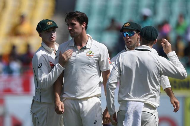 Australia's Pat Cummins (second from left) celebrates the wicket of India's Ravindra Jadeja with teammates during the third day of the fourth and last Test in Dharamsala on March 27, 2017. (AFP) Australia's Pat Cummins (second from left) celebrates the wicket of India's Ravindra Jadeja with teammates during the third day of the fourth and last Test in Dharamsala on March 27, 2017. (AFP)