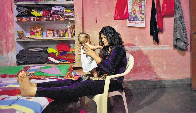 Pooja Singh Rajput with her daughter Srishti at their home in Ara, Bihar. (Ravi Choudhary/HT PHOTO)