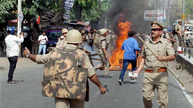 Police in action after violence broke out during an Ambedkar Jayanti Shobhayatra in Saharanpur carried out by BJP MP Raghav Lakhanpal. (PTI) Police in action after violence broke out during an Ambedkar Jayanti Shobhayatra in Saharanpur carried out by BJP MP Raghav Lakhanpal. (PTI)