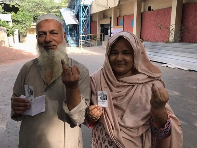 A couple show their ink-marked finger after casting vote at Rajpura Road polling station in New Delhi. (Ravi Choudhary /HTPhoto) A couple show their ink-marked finger after casting vote at Rajpura Road polling station in New Delhi. (Ravi Choudhary /HTPhoto)