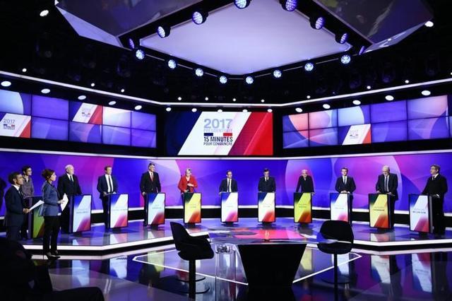 The 11 French presidential election candidates take part in a special political television show entitled ‘15 mins to Convince’ at the studios of French Television channel France 2 in Saint-Cloud, near Paris, on April 20, 2017. (Reuters)