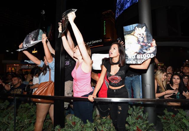 Anti-fur activists protest an appearance by television personality Kylie Jenner (not pictured) as she arrives at Sugar Factory American Brasserie at the Fashion Show mall on April 22, 2017 in Las Vegas, Nevada. (AFP)
