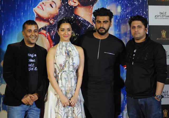 Shraddha Kapoor (2L), Arjun Kapoor (2R), writer Chetan Bhagat (L) and director Mohit Suri (R) attend the trailer launch of Hindi film Half Girlfriend in Mumbai on April 10, 2017. (AFP) Shraddha Kapoor (2L), Arjun Kapoor (2R), writer Chetan Bhagat (L) and director Mohit Suri (R) attend the trailer launch of Hindi film Half Girlfriend in Mumbai on April 10, 2017. (AFP)
