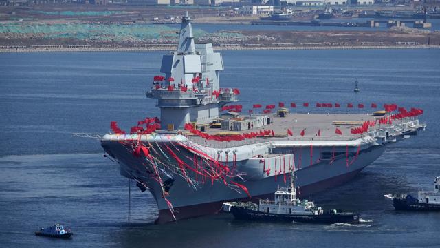 Type 001A, China's second aircraft carrier, is seen during its launch ceremony at Dalian shipyard in northeast China's Liaoning Province on April 26, 2017. It is the first domestically designed and built aircraft carrier, state media said, as China seeks to transform its navy into a force capable of projecting power on the high seas. (AFP) Type 001A, China's second aircraft carrier, is seen during its launch ceremony at Dalian shipyard in northeast China's Liaoning Province on April 26, 2017. It is the first domestically designed and built aircraft carrier, state media said, as China seeks to transform its navy into a force capable of projecting power on the high seas. (AFP)