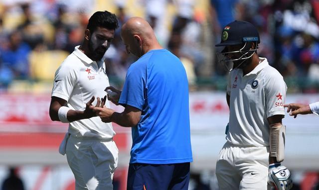India's physio Patrick Farhart (C) applies a spray on the finger of Lokesh Rahul (L) as teammate Cheteshwar Pujara (R) looks on during the second day of play of the fourth Test in Dharamsala on March 26, 2017. (AFP) India's physio Patrick Farhart (C) applies a spray on the finger of Lokesh Rahul (L) as teammate Cheteshwar Pujara (R) looks on during the second day of play of the fourth Test in Dharamsala on March 26, 2017. (AFP)