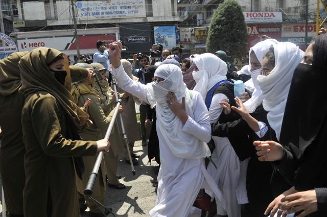 Kashmiri students shout slogans during a protest at Lal Chowk, Srinagar on April 17. (Waseem Andrabi / HT Photo) Kashmiri students shout slogans during a protest at Lal Chowk, Srinagar on April 17. (Waseem Andrabi / HT Photo)