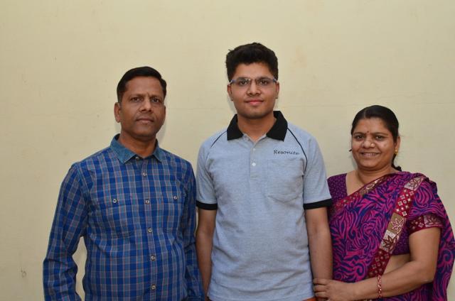 JEE Main 2017 topper Kalpit with his parents. (Handout image) JEE Main 2017 topper Kalpit with his parents. (Handout image)