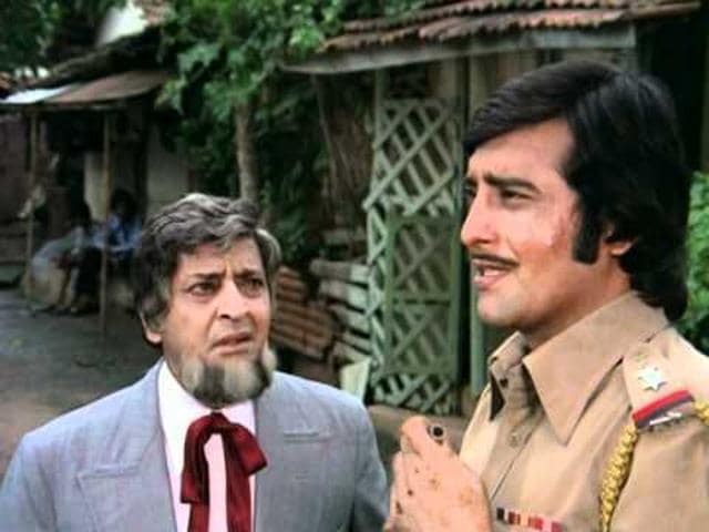 Vinod Khanna and Pran in a still from Amar Akbar Antony.