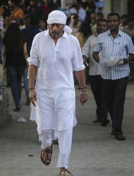 Jackie Shroff leaves after attending the funeral. (AP) Jackie Shroff leaves after attending the funeral. (AP)