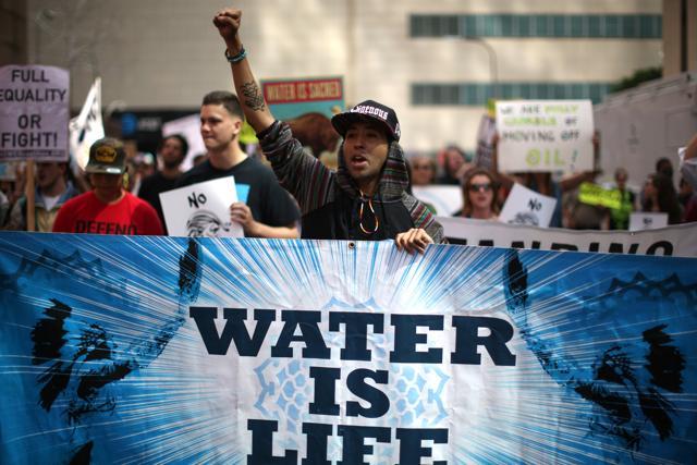 A protest against Trump's executive order fast-tracking the Keystone XL and Dakota Access oil pipelines in Los Angeles. (Reuters) A protest against Trump's executive order fast-tracking the Keystone XL and Dakota Access oil pipelines in Los Angeles. (Reuters)