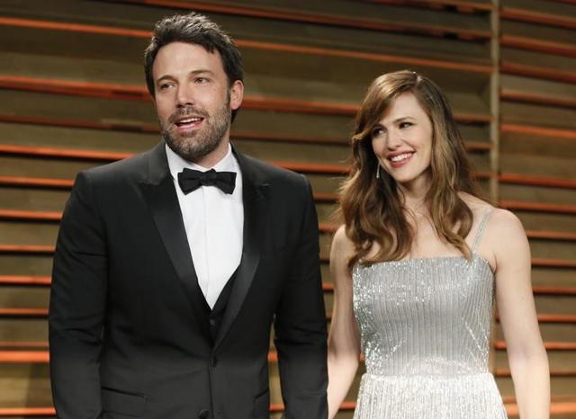 Actor Ben Affleck and his wife, actress Jennifer Garner arrive at the 2014 Vanity Fair Oscars Party in West Hollywood, California March 2, 2014. Actor Ben Affleck and his wife, actress Jennifer Garner arrive at the 2014 Vanity Fair Oscars Party in West Hollywood, California March 2, 2014.