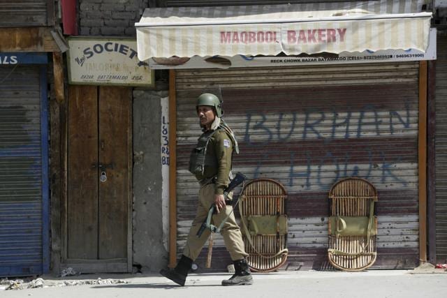 A soldier patrols during a strike in Srinagar, Kashmir. (AP Photo) A soldier patrols during a strike in Srinagar, Kashmir. (AP Photo)