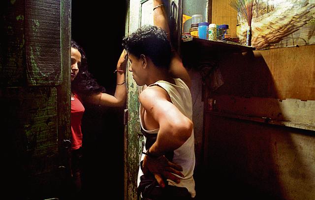 An old file photo of a sex worker negotiating with a client in a red light area in Kolkata. (Getty Images) An old file photo of a sex worker negotiating with a client in a red light area in Kolkata. (Getty Images)