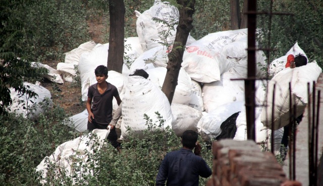 Workers of the nearby factories evacuating the area. (JS Grewal/HT) Workers of the nearby factories evacuating the area. (JS Grewal/HT)