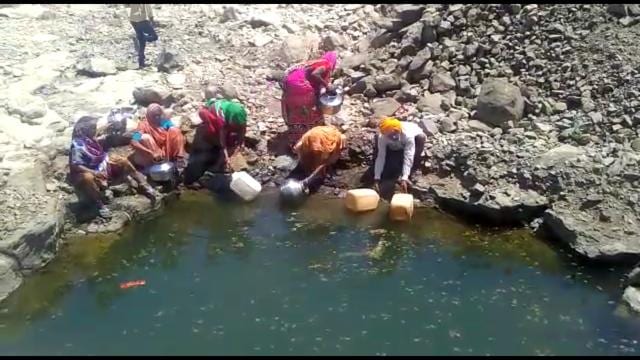 A makeshift well Dalits dug on the banks of the Kalisindh river after their well was contaminated with kerosene. (HT PHOTO) A makeshift well Dalits dug on the banks of the Kalisindh river after their well was contaminated with kerosene. (HT PHOTO)