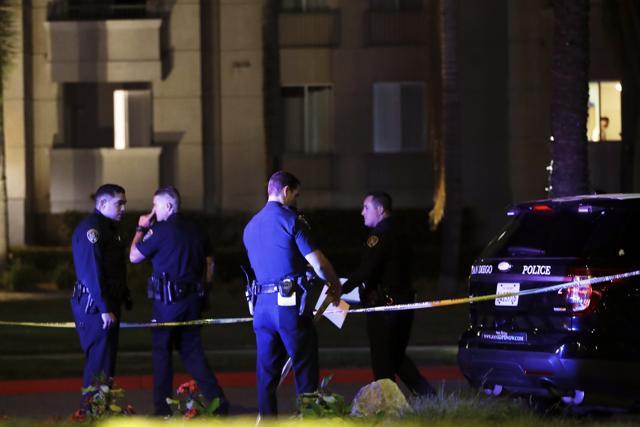 San Diego police officers stand in front of a cordoned off La Jolla apartment after the shooting on Sunday. (AP Photo) San Diego police officers stand in front of a cordoned off La Jolla apartment after the shooting on Sunday. (AP Photo)