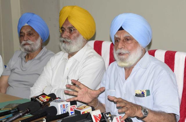 Khalsa College Governing Council president Satyajit Singh Majithia (right) and others addressing the media in Amritsar on Monday, May 1. (Sameer Sehgal/HT)